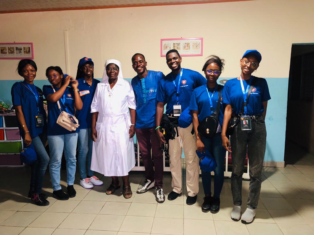 team member with orphanage leader