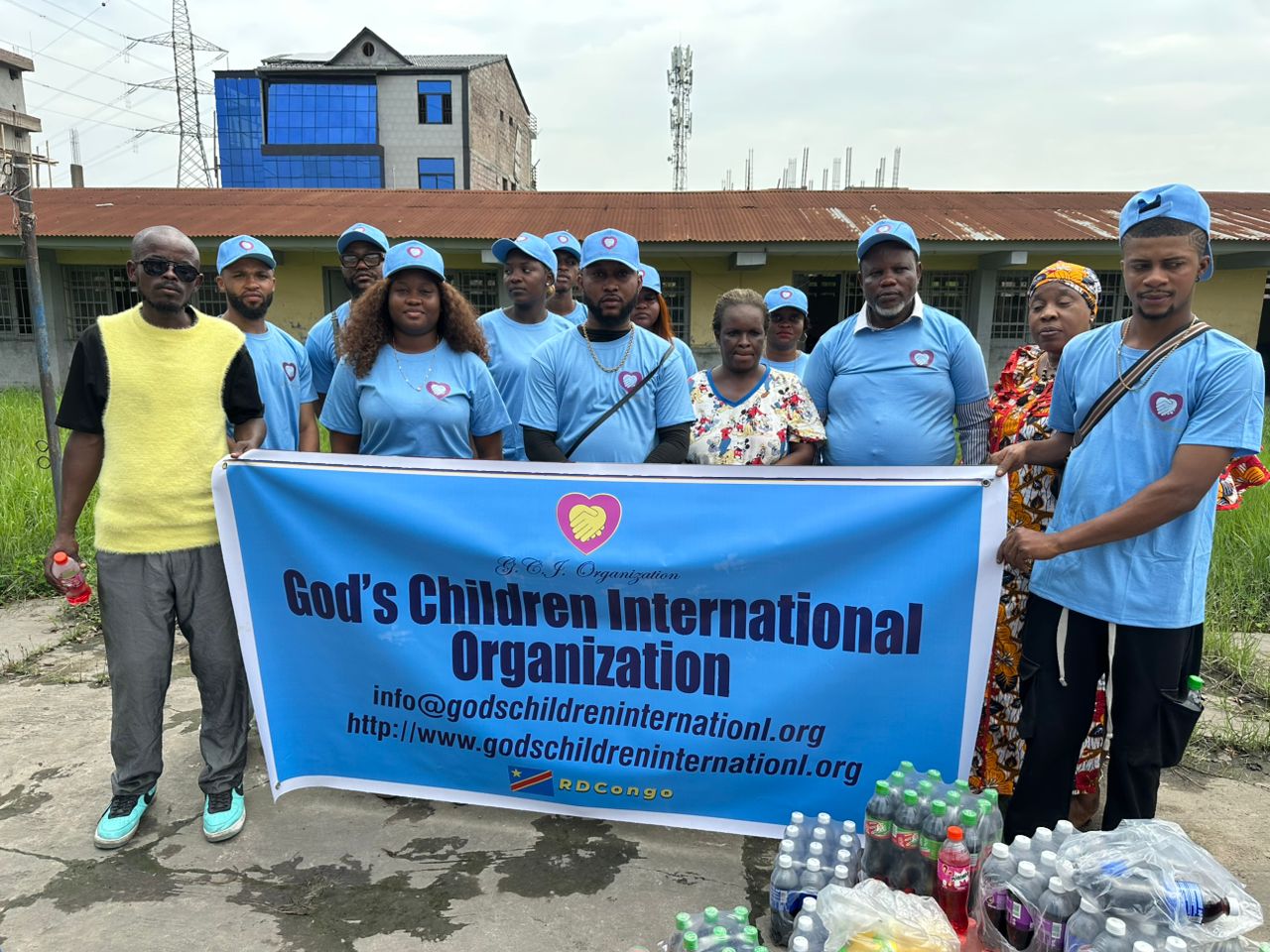 DRC team holding sign